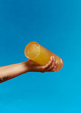 Modern Dose's Joint Support product with turmeric (curcumin), type II collagen, boswellia serrata being shaken in a water bottle  - moderndose.com